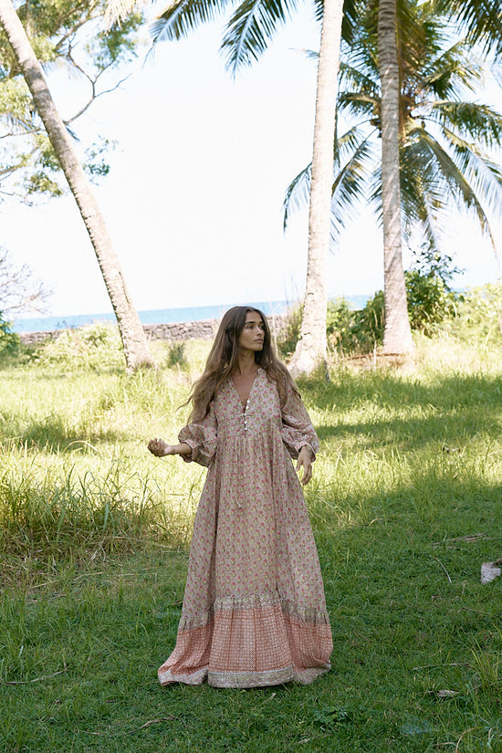 Bhoomi Maxi Dress Sunset — full silhouette among palm trees, hand block print ethical cotton | Daughters of India