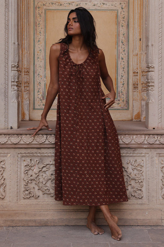 Sundress Midi Almond — studio full length front view, model facing camera, sleeveless sundress with tie-gather neckline, flowing A-line midi skirt, hand block print almond cotton, artisan Jaipur India | Daughters of India